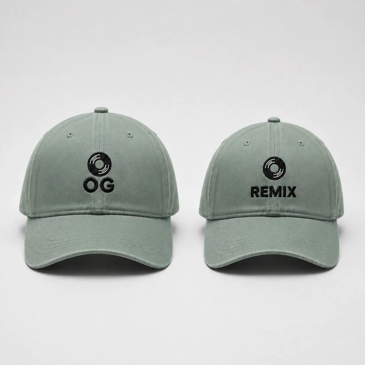 Two green baseball caps with 'OG' and 'REMIX' logos on a white background