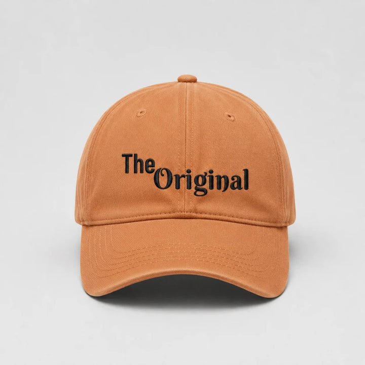 Brown cap with 'The Original' text on a light gray background