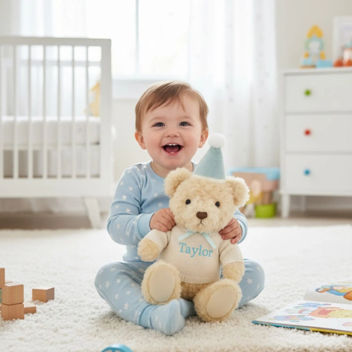 Toddler holding his Personalised Snuggle Bunnies Birthday Arthur - Sky