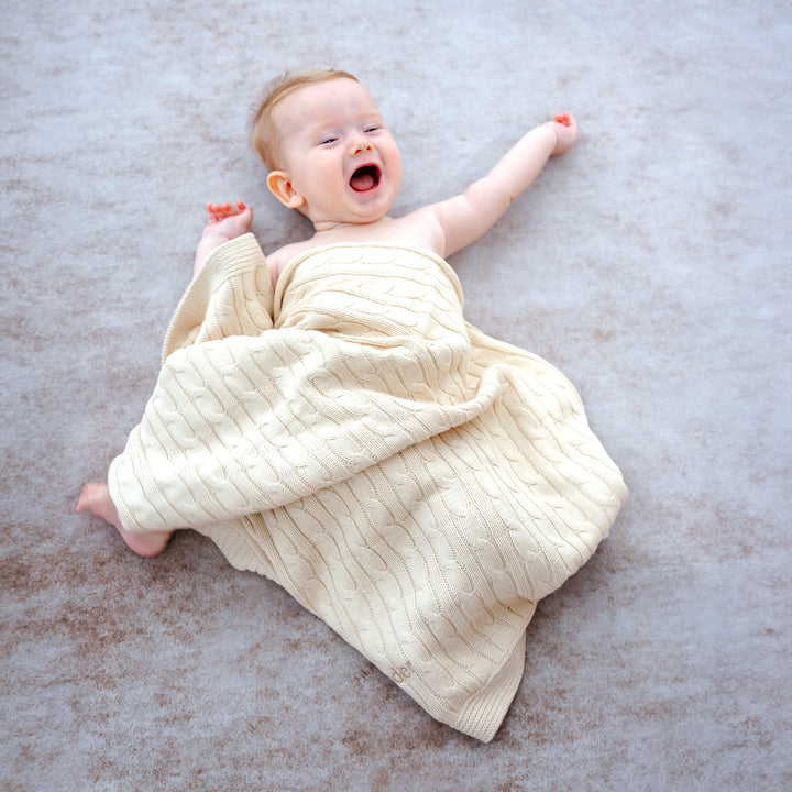 Baby covering in Cream Cable Knit Blanket