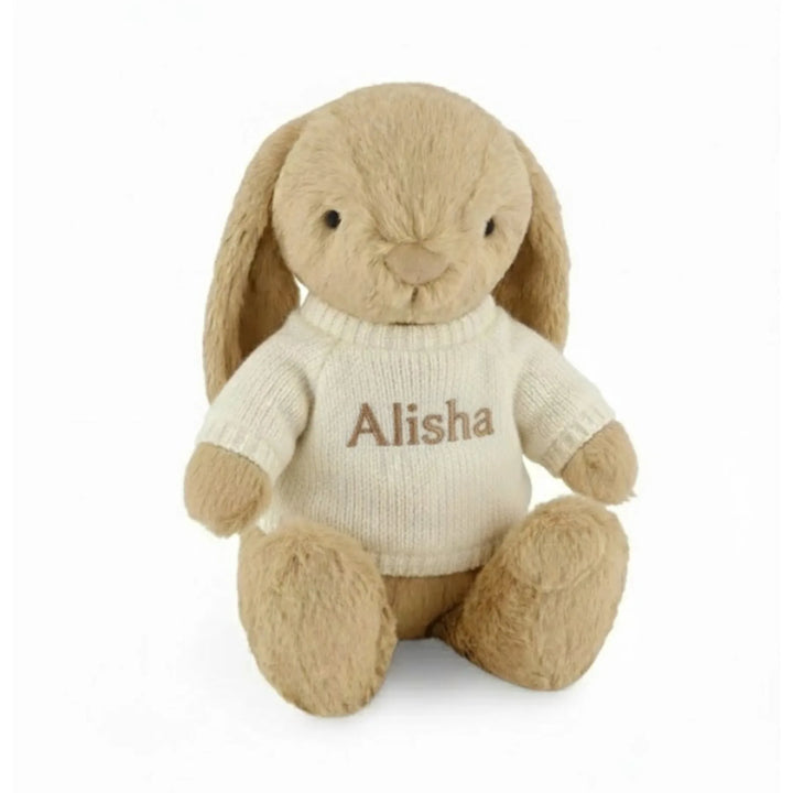 Snuggle Bunnies Penelope Bunny - Caramel wearing a personalised sweater