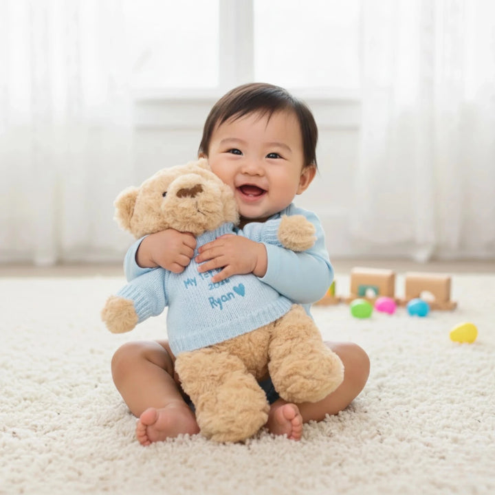 Baby hugging his Easter Bear, personalised with his name