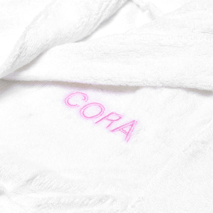 White Bamboo Robe personalised with "CORA" in pink thread