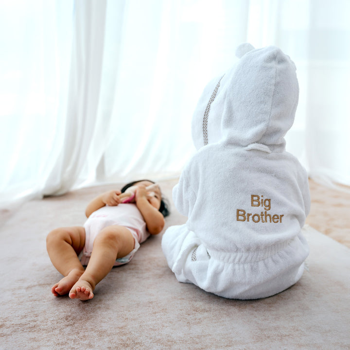 Baby girl and older brother in sibling robe with back customised with "Big Brother"