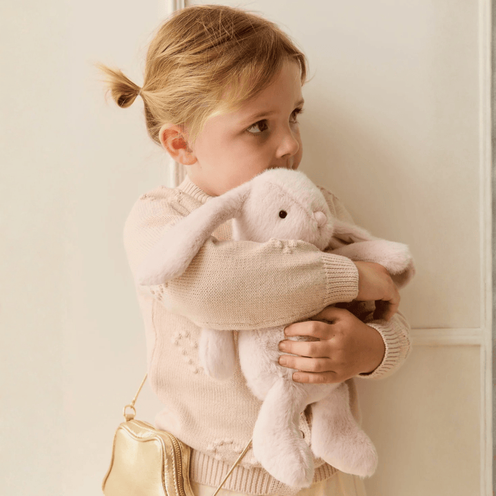 Little girl hugging Snuggle Bunnies Penelope - Blossom