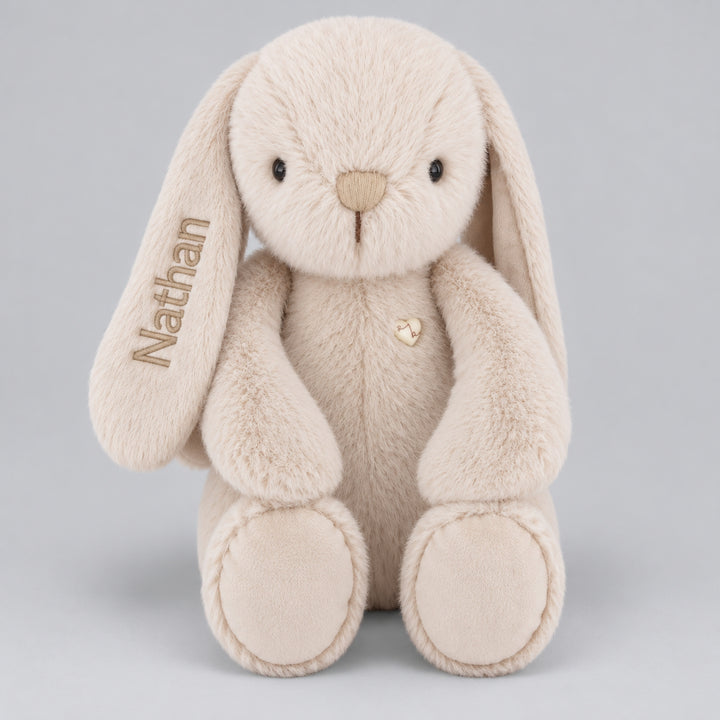 Beige Snuggle Bunnies plush bunny with personalised "Nathan" embroidery on its floppy ear.
