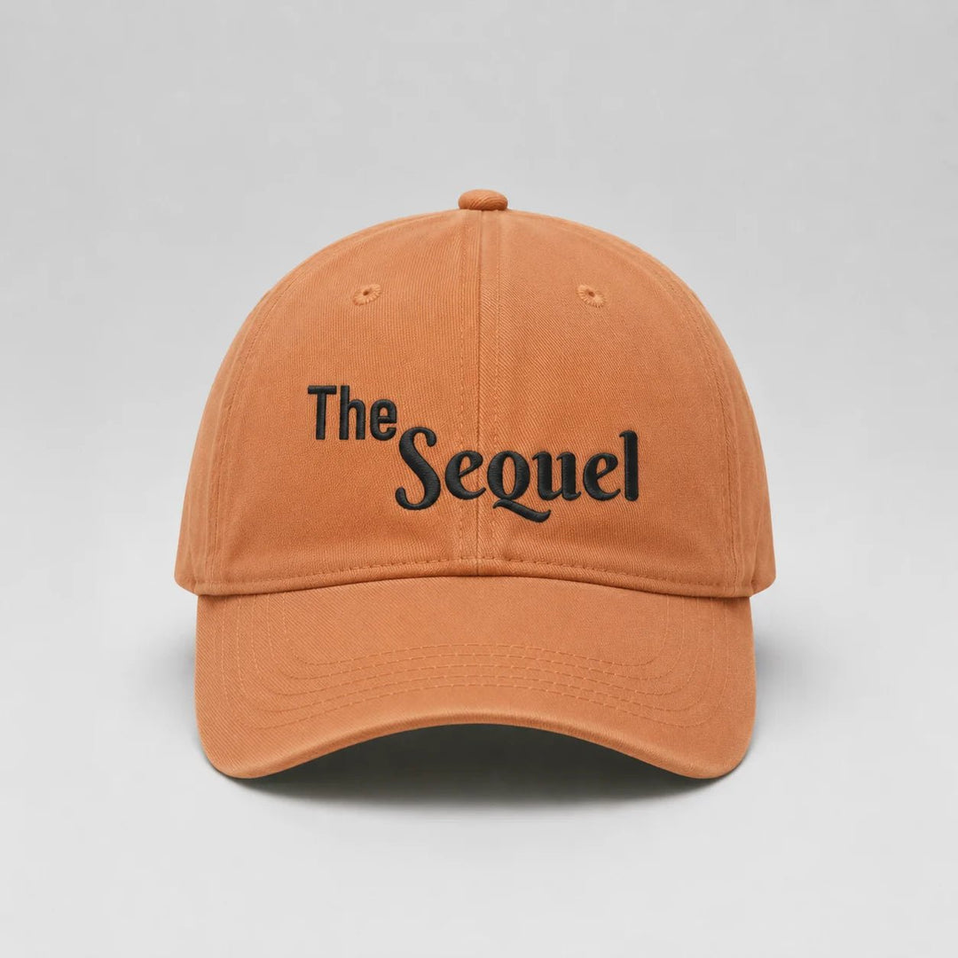 Brown cap with 'The Sequel' text on a light gray background