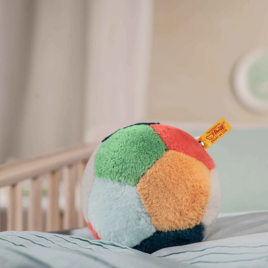 Close-up of steiff musical ball, soft and loved by many.