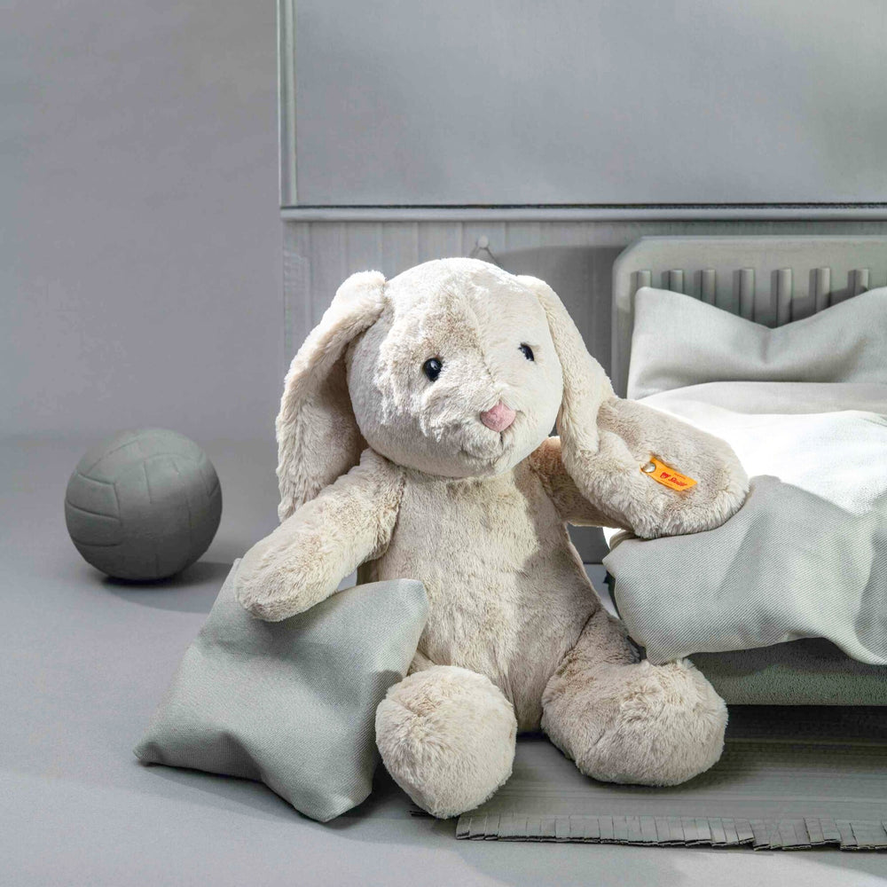 Cuddly grey rabbit soft toy with bean bag paws and ears, ideal for snuggles and playtime