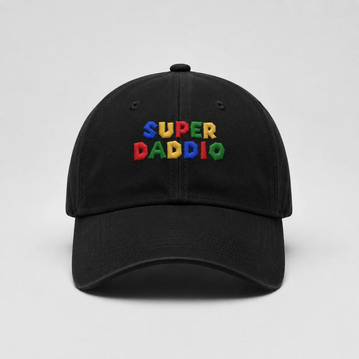 Black cap with 'SUPER DADDIO' text in colorful letters on a light gray background