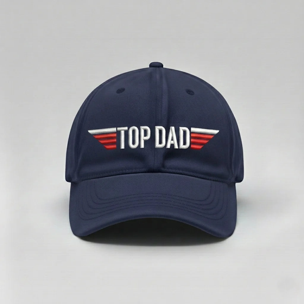 Navy blue cap with 'TOP DAD' text on a light gray background