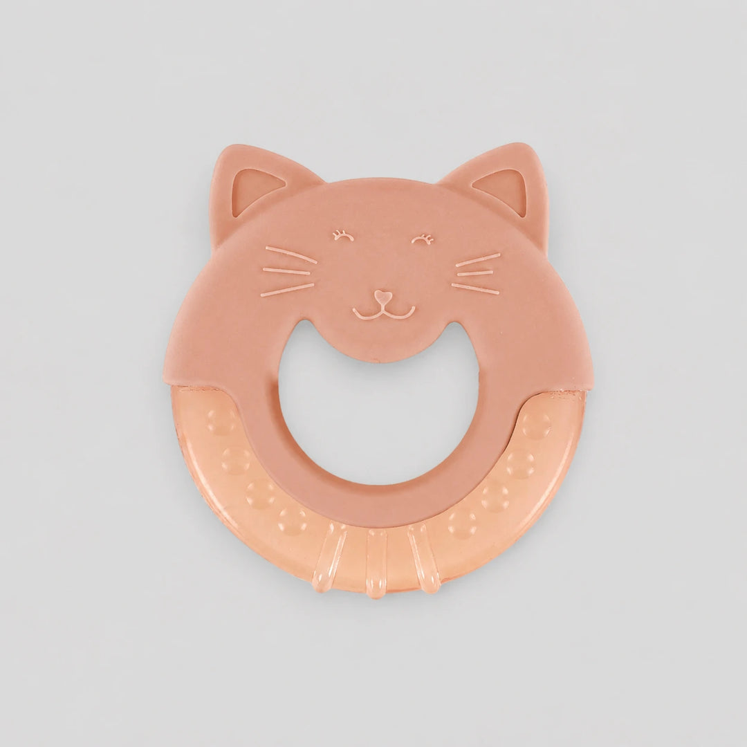 Trixie Mrs Cat Cooling Baby Teether. A peach-colored cat-shaped baby teether with a textured ring handle, shown on a neutral light gray background.. 
