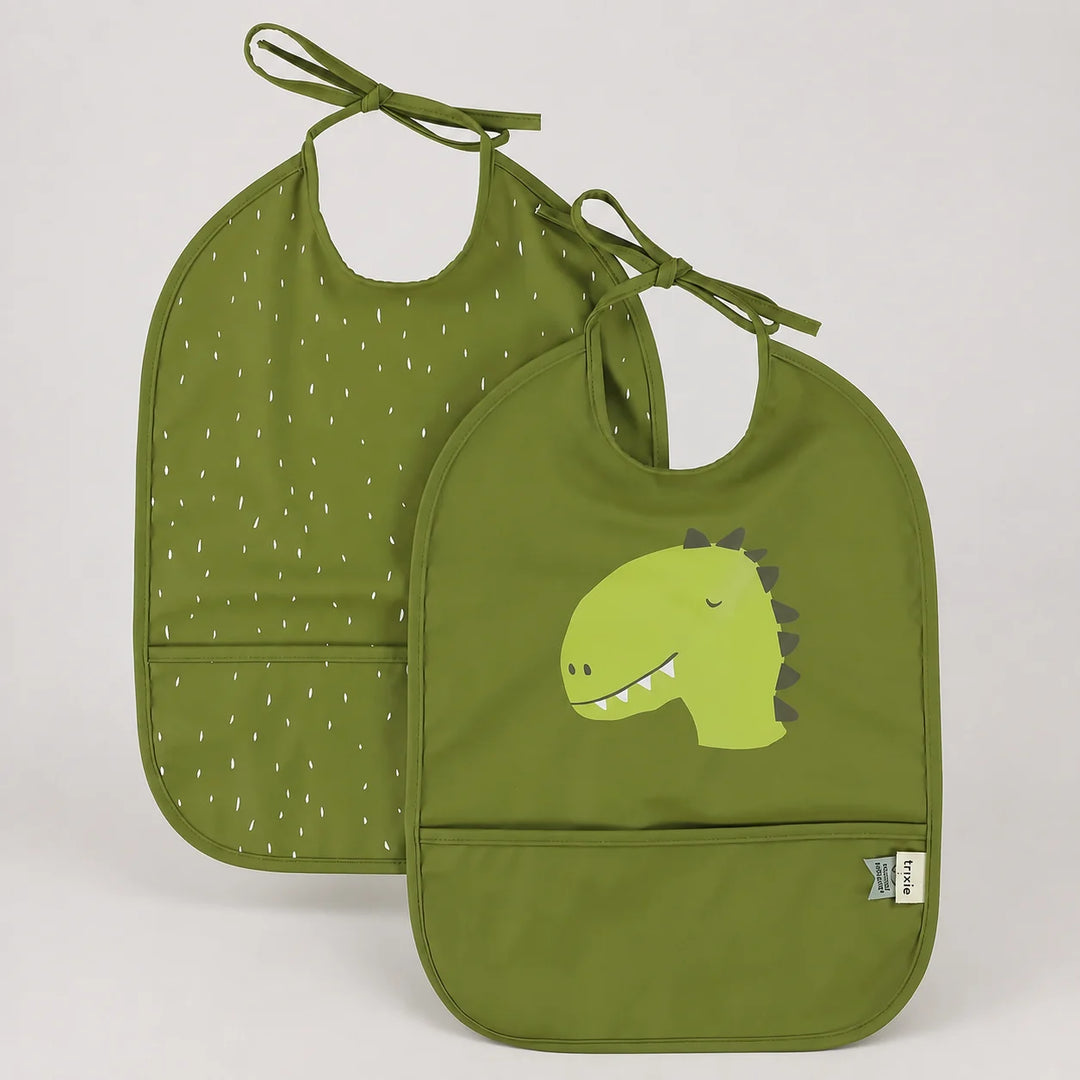 Trixie Mr Dino waterproof baby bib in green with front pocket and tie closure