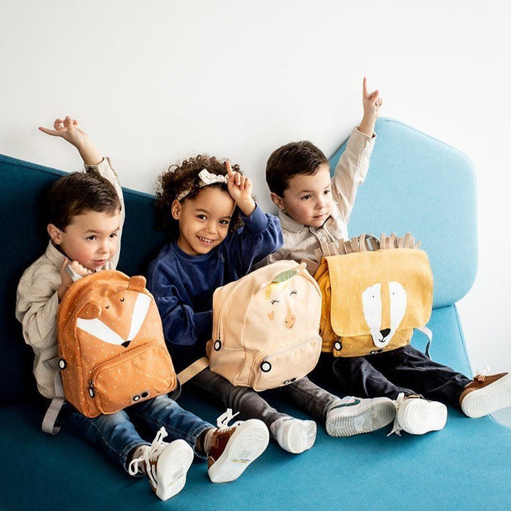 Children smiling with their Trixie Backpacks