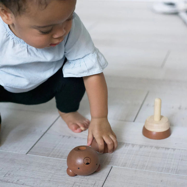 Baby Playing with Wee Gallery Wood Stacker Toy 