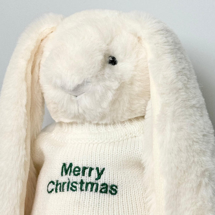 Up close of Twinkle Bunny wearing Cream jumper with "Merry Christmas" wordings