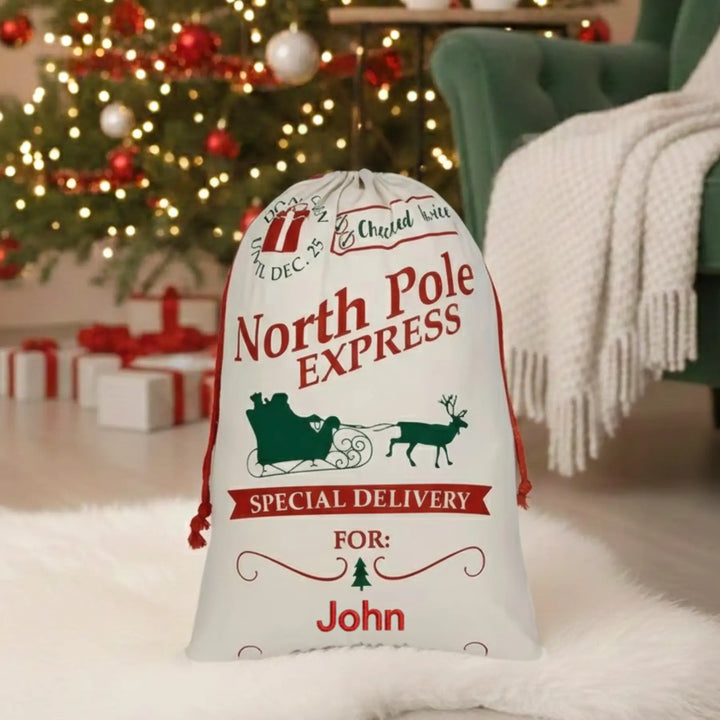 Personalized Santa sack with 'North Pole Express' text in a festive room with Christmas tree and presents.